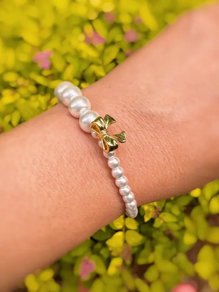 Bracelets Ellison Young Dangle Bow Pearl Bracelet
