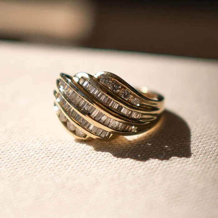 Consider the Wldflwrs Rings Diamond and Baguette Swirl Ring Consider the Wldflwrs Rings Diamond and Baguette Swirl Ring