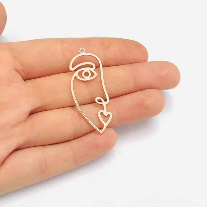 Earrings Peppy Beads Face Outline Rose Gold Plated Brass Charms Abstract Face Pendants 2 pcs in a pack Earrings Peppy Beads Face Outline Rose Gold Plated Brass Charms Abstract Face Pendants 2 pcs in a pack
