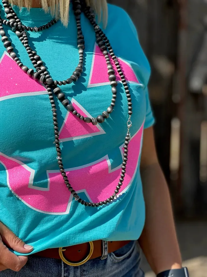 TEXAS TRUE THREADS Necklaces GLITTER JACK O LANTERN TEE SEA GREEN WITH PINK GLITTER